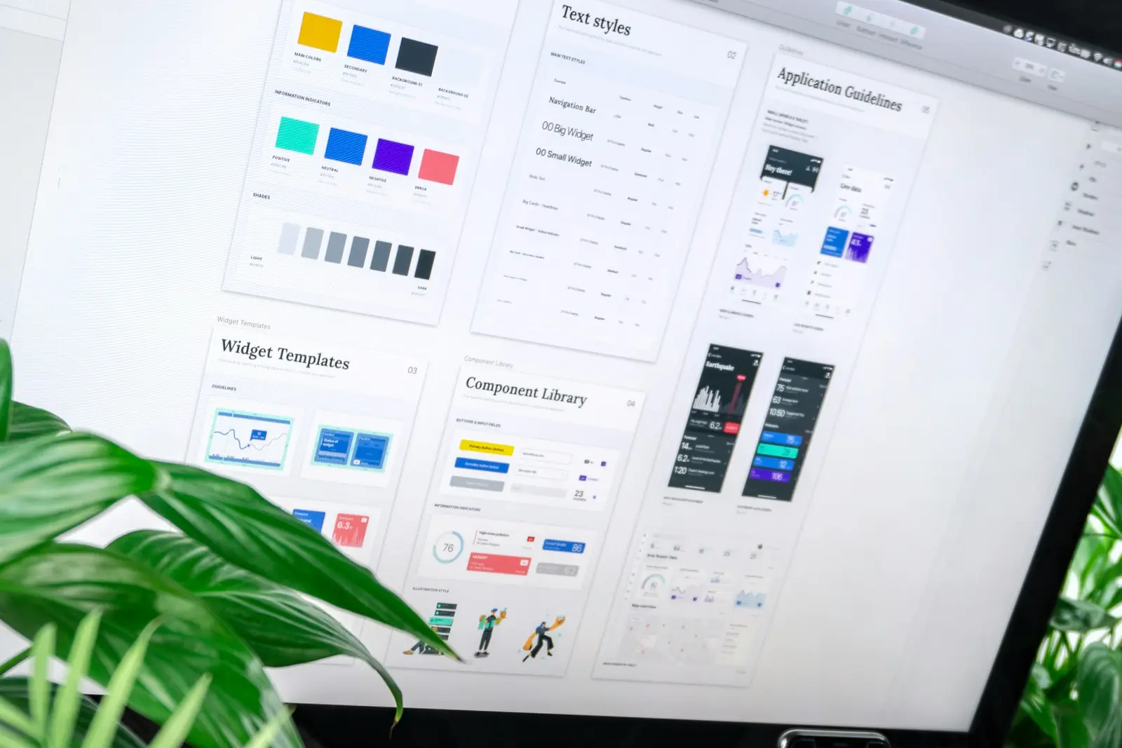 A website design system with colours, text styles and components on a large screen